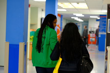 Helping hand from a volunteer in Moorfields Eye Hospital