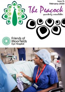 One of our Volunteers holding a patient's hand during an operation in the theatre.