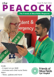 The front cover of the Peacock for April 2024. It shows two volunteers smiling while working together in the Accident & Emergency department.