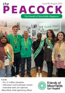 The cover of Peacock, showing a group of volunteers smiling together in front of a Volunteers' Week display.