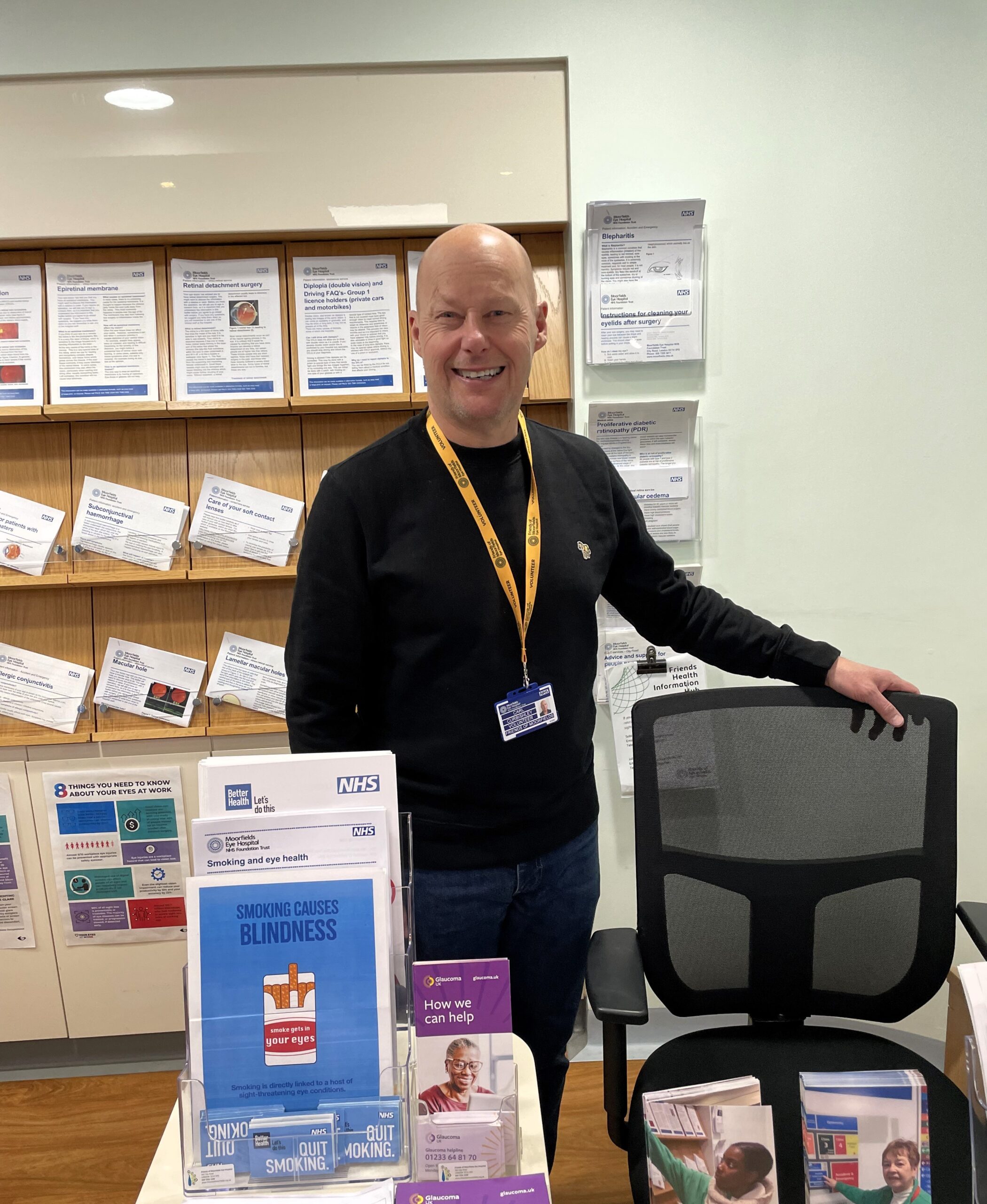 Carl stands smiling in the Health Information Hub.