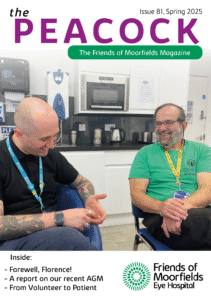 The front cover of Peacock, Spring 2025. It shows a volunteer and a staff member laughing together.